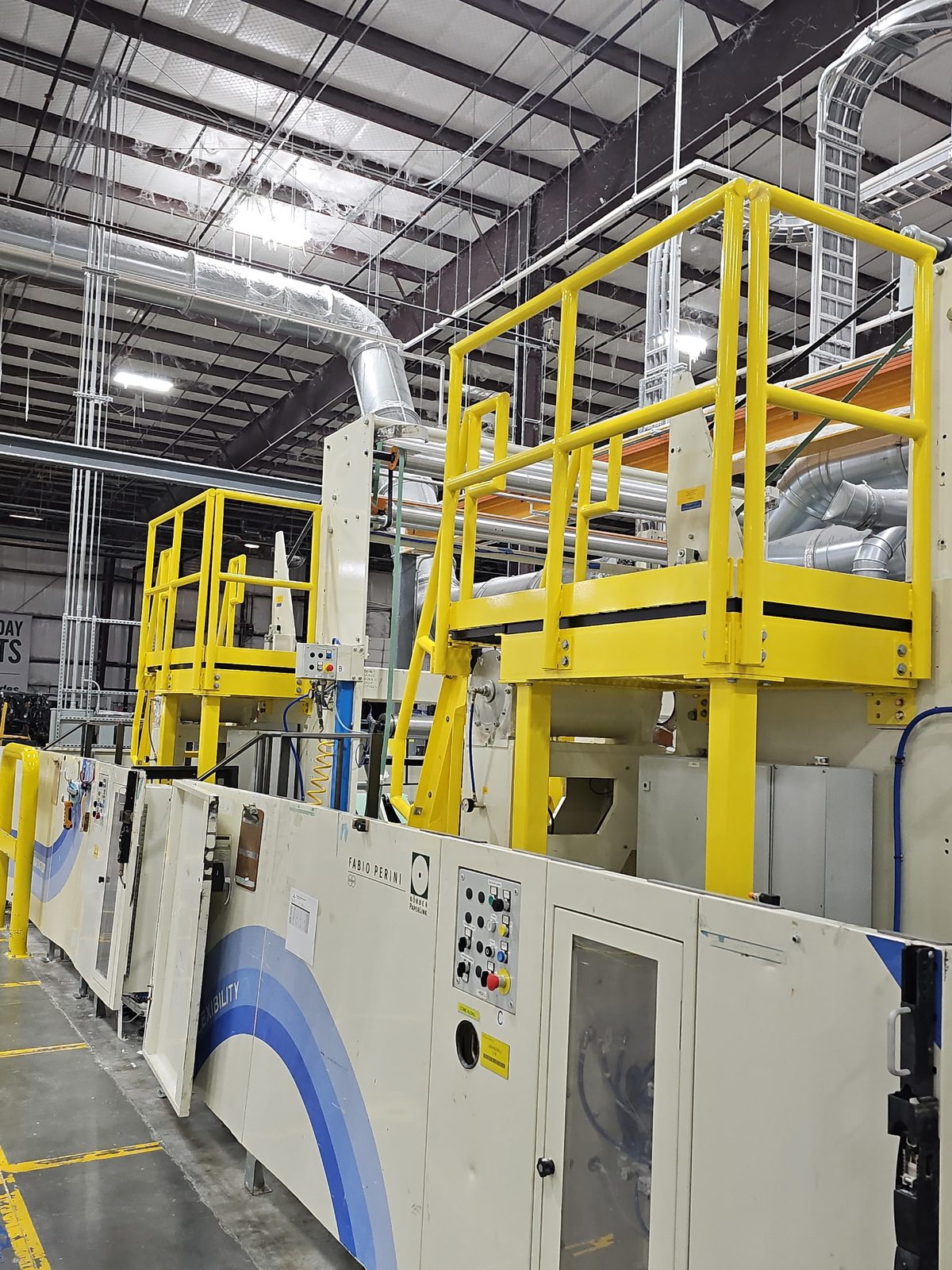 Fabricated safety platforms inside manufacturing plant